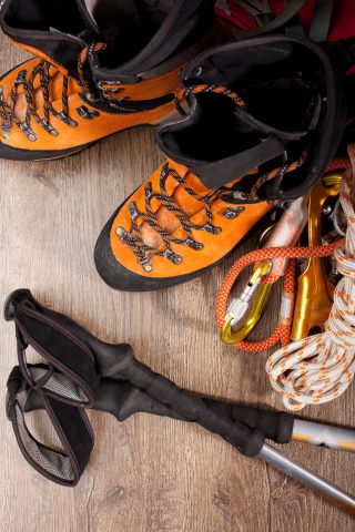 Hiking boots with trekking poles